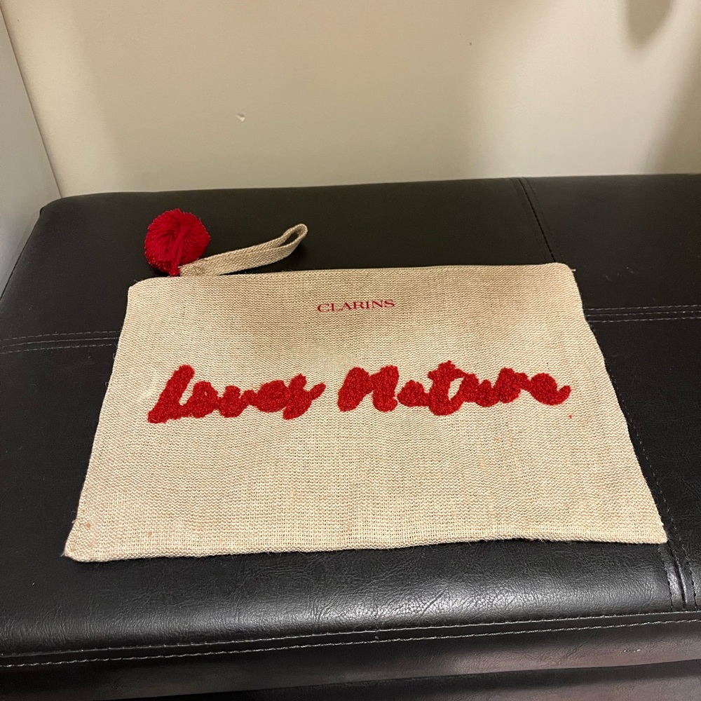 Clarins Natural Canvas Cosmetic Bag with Red Accents